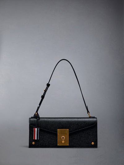 MRS. THOM CLUTCH IN PEBBLE GRAIN LEATHER