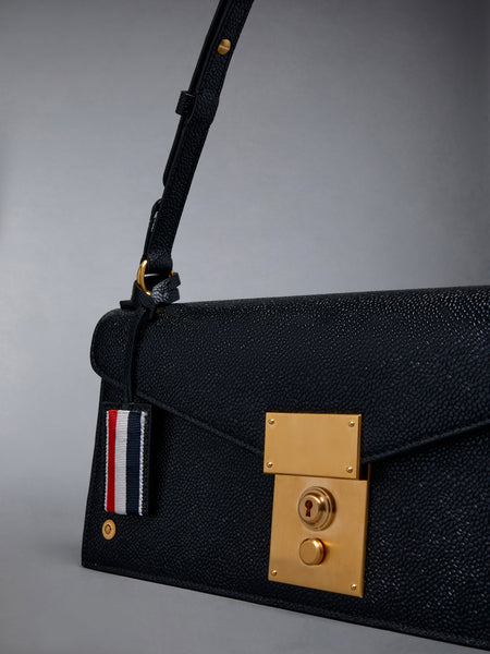 MRS. THOM CLUTCH IN PEBBLE GRAIN LEATHER BLACK