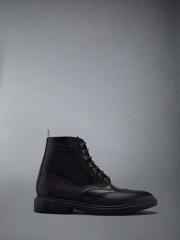 PEBBLE GRAIN LEATHER SOLE WINGTIP BOOT - featured image