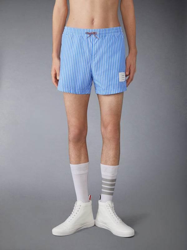 PINSTRIPE PRINTED TECH SWIM SHORTS - image 1