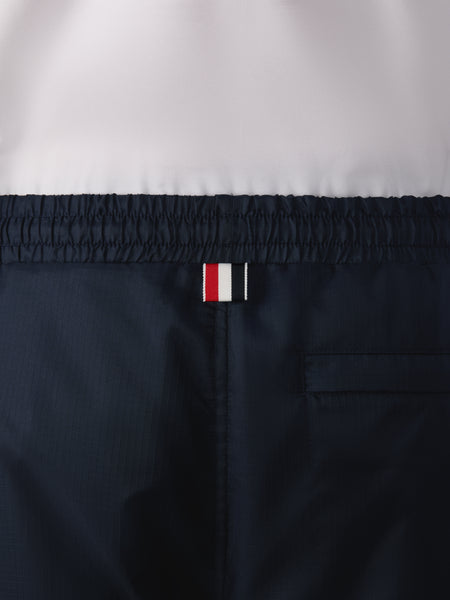 SHINY RIPSTOP 4-BAR TRACK PANTS NAVY