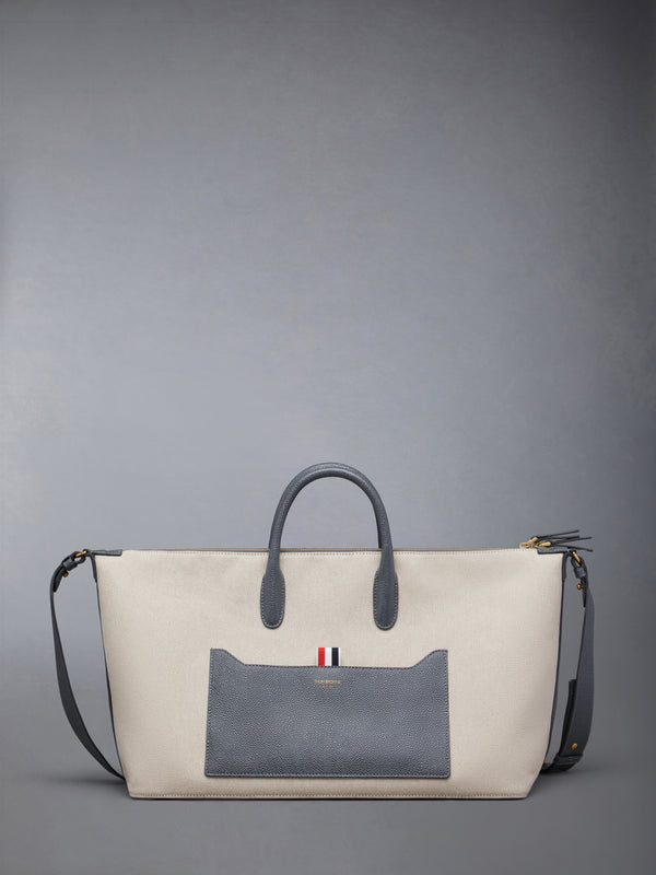 MEDIUM DUFFLE IN SALT AND PEPPER COTTON CANVAS - featured image