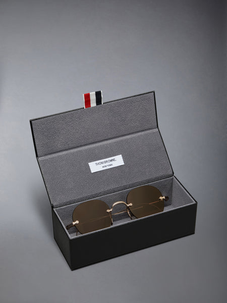 TITANIUM RIMLESS ROUND SUNGLASSES WHITE GOLD