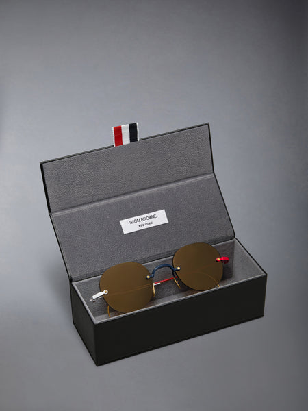 TITANIUM RIMLESS ROUND SUNGLASSES NAVY WITH RED AND WHITE