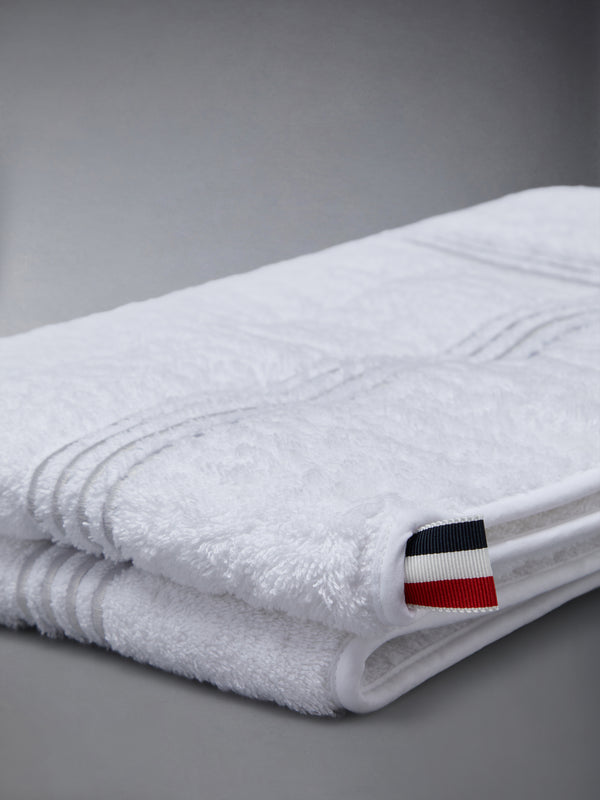 4-BAR FRETTE QUILTED BATH MAT - featured image